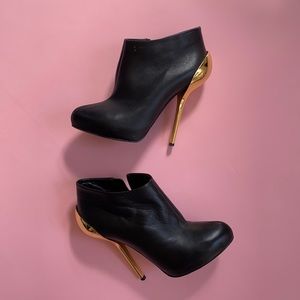 Giuseppe Zanotti daring heels with metal detail heels